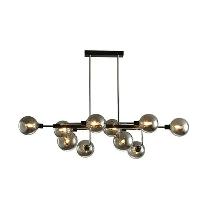 Modern chrome and black metal sputnik hanging island light with multiple glass globes for dining room illumination