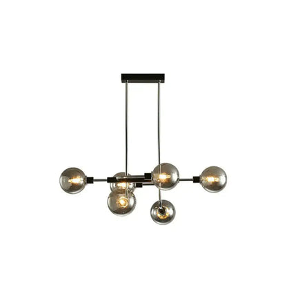 Modern black sputnik hanging island light with six glass bulbs and chrome rods for dining room decor by DecorBites