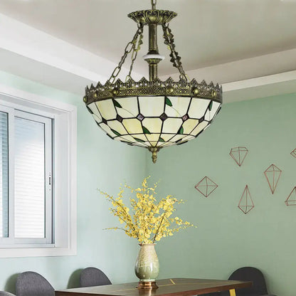 Decorbites stained glass bowl pendant light with antique brass finish and lodge leaf geometric cream and green panels