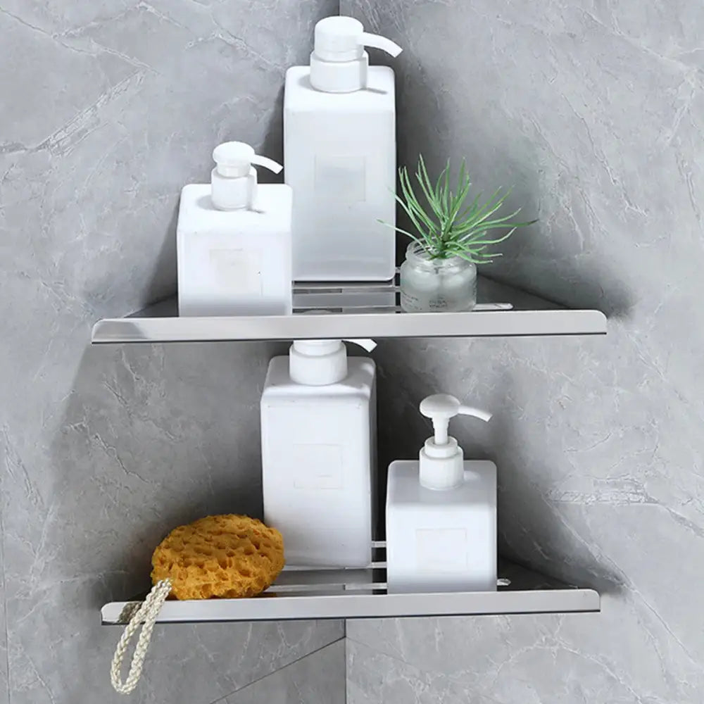 Silver stainless steel corner shower shelf organizer with sleek modern triangular design by DecorBites™