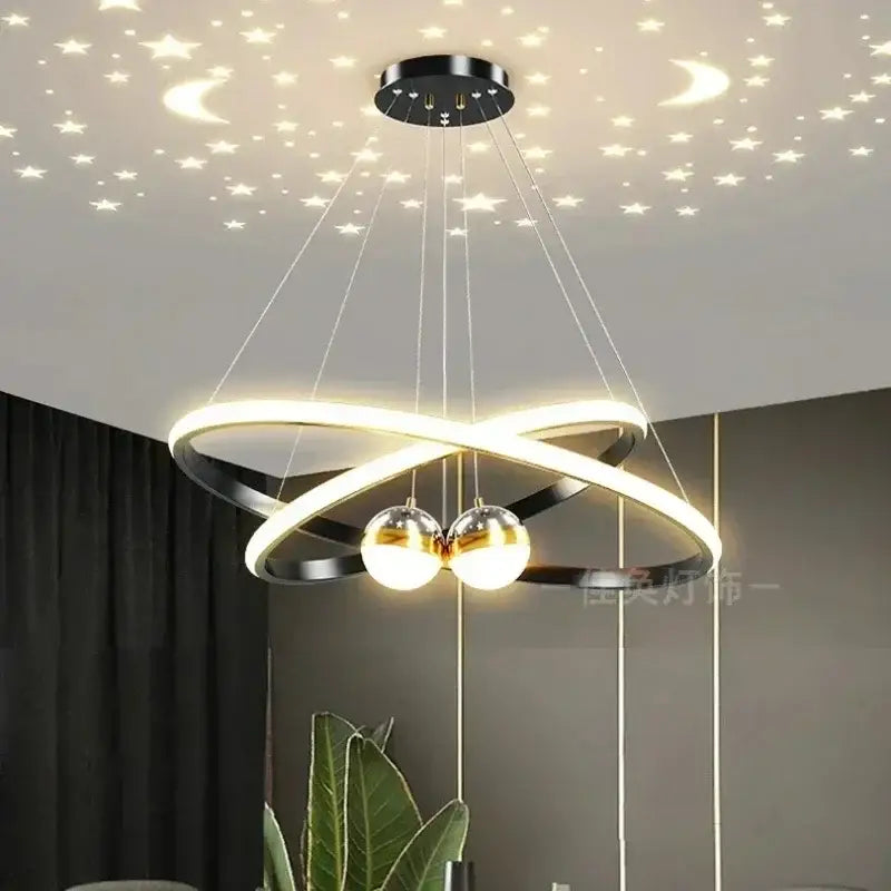 Modern black and gold led chandelier with intertwined rings and spherical bulbs for living room starry sky decor