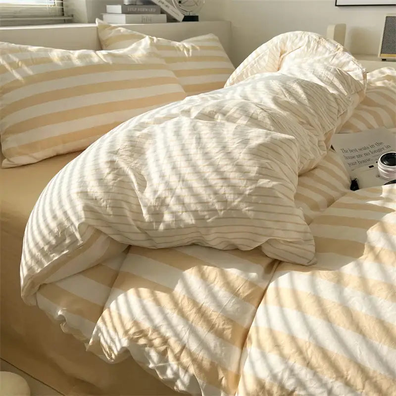 DecorBites™ striped quilt set with cream and white bed sheet featuring soft plush texture and matching pillowcases