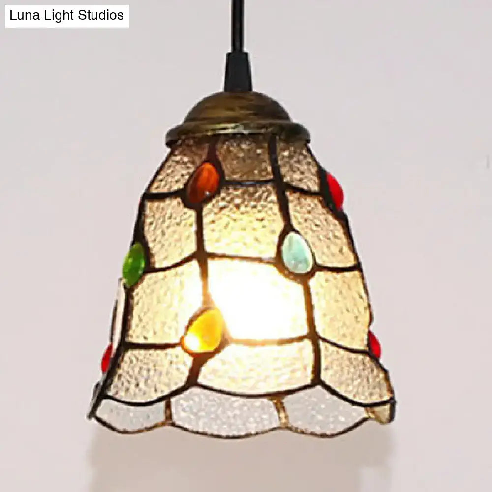 Vintage-style glass trumpet ceiling lamp with amber textured base and colorful gemstone accents in tiffany style