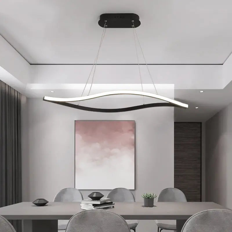 Modern black and white aluminum leaf led island light with sleek curved design for dining room décor by decorbites
