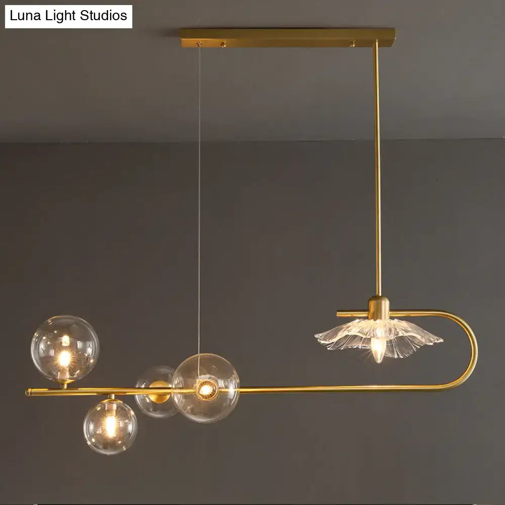 Decorbites stylish postmodern suspension lamp in gold tone with clear glass globe bulbs and lotus leaf design shade