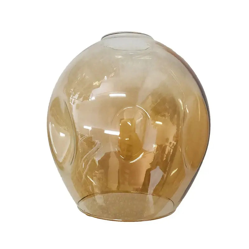 Amber-tinted glass globe lampshade with smooth rounded design and subtle ridges for modern chandelier lighting