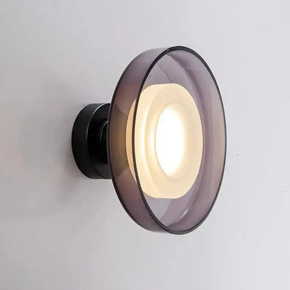 Decorbites™ stylish led wall lamp with sleek black base and translucent purple glass shade emitting warm ambient light