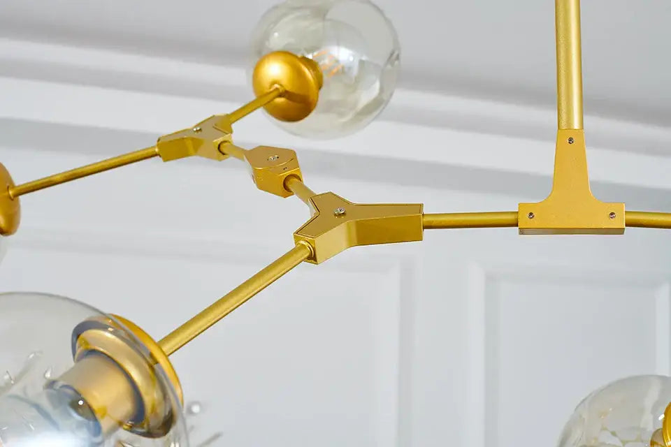 DecorBites™ stylish nordic chandelier with gold-toned metal frame and clear glass globe bulbs for modern living spaces