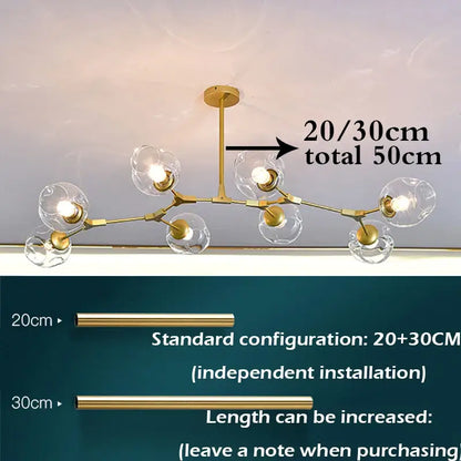 Gold-toned modern chandelier with clear glass globe shades and branching metal frame stylish nordic chandelier for living room