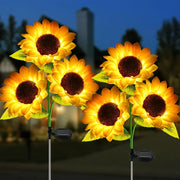 Set of five decorbites™ sunflower solar led garden lights with auto brightness, glowing yellow petals, and solar panel stakes