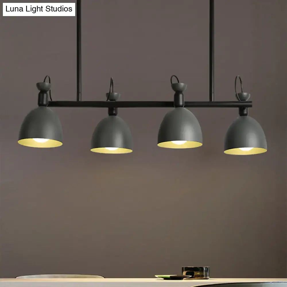 Modern black metal pendant light fixture with four dome shades emitting warm yellow light type for dining room 110v-120v