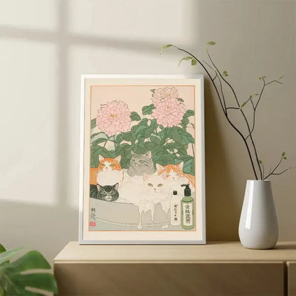 A framed DecorBites™ canvas wall art featuring five tabby cats among pink peonies with pet shampoo bottle