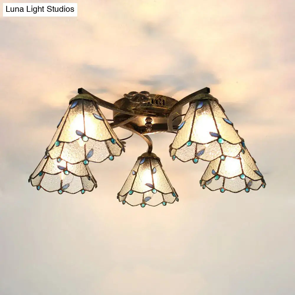 DecorBites™ tiffany stained glass ceiling light with three bell-shaped shades in antique bronze for bedroom use