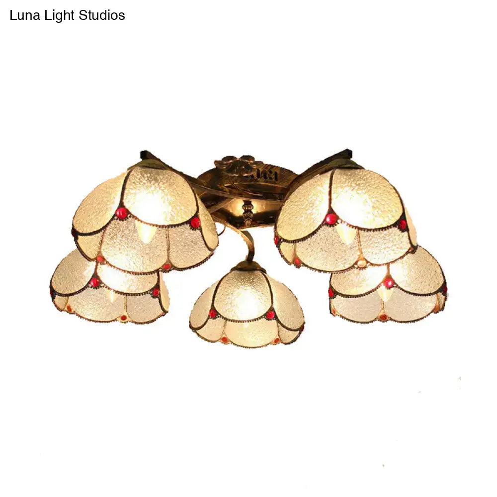 DecorBites™ antique bronze ceiling light with five scalloped tiffany stained glass shades and red gemstone accents