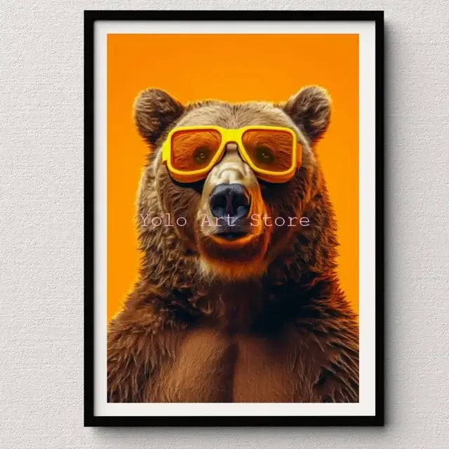 A framed DecorBites™ tiger canvas wall art print featuring a brown bear with bright yellow sunglasses on orange background