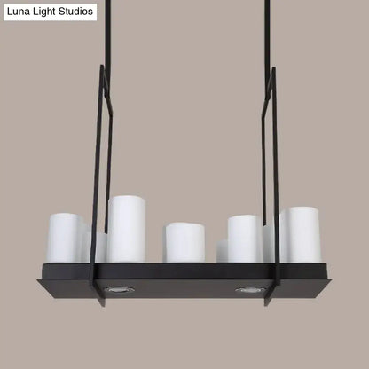 Black metal island pendant light with five white traditional barrel frosted glass shades for dining room use
