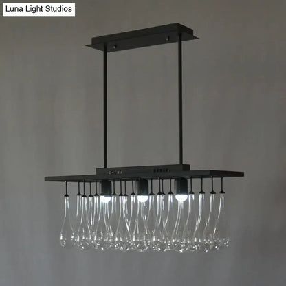 DecorBites™ traditional black metal island pendant light with three clear glass rectangles and warm white light