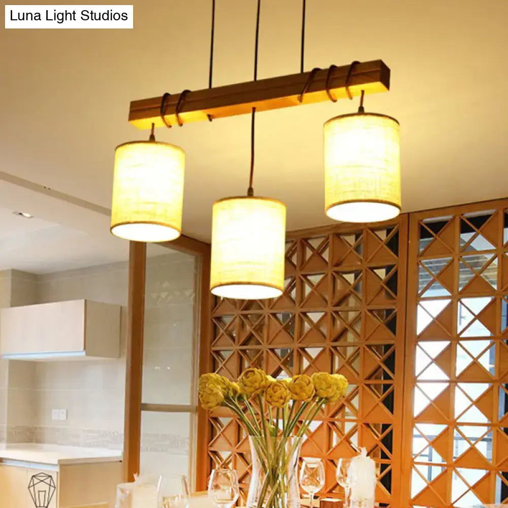 Warm-toned decorbites traditional fabric wood pendant barrel lights with textured shades hang over dining room bar with e26 e27 sockets