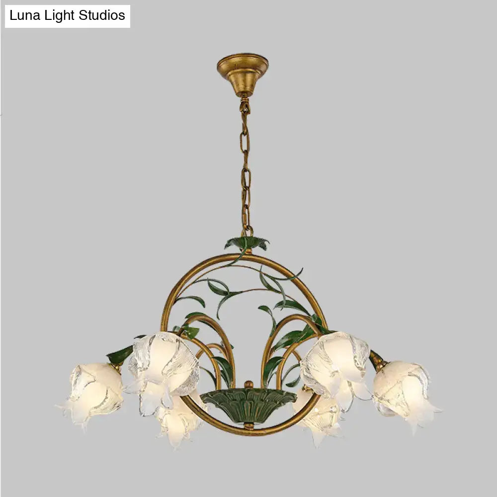 Antique brass DecorBites traditional floral chandelier with five frosted glass flower shades and green leaf accents compatible with e12 e14 110v-120v and 220v-240v led incandescent fluorescent bulbs