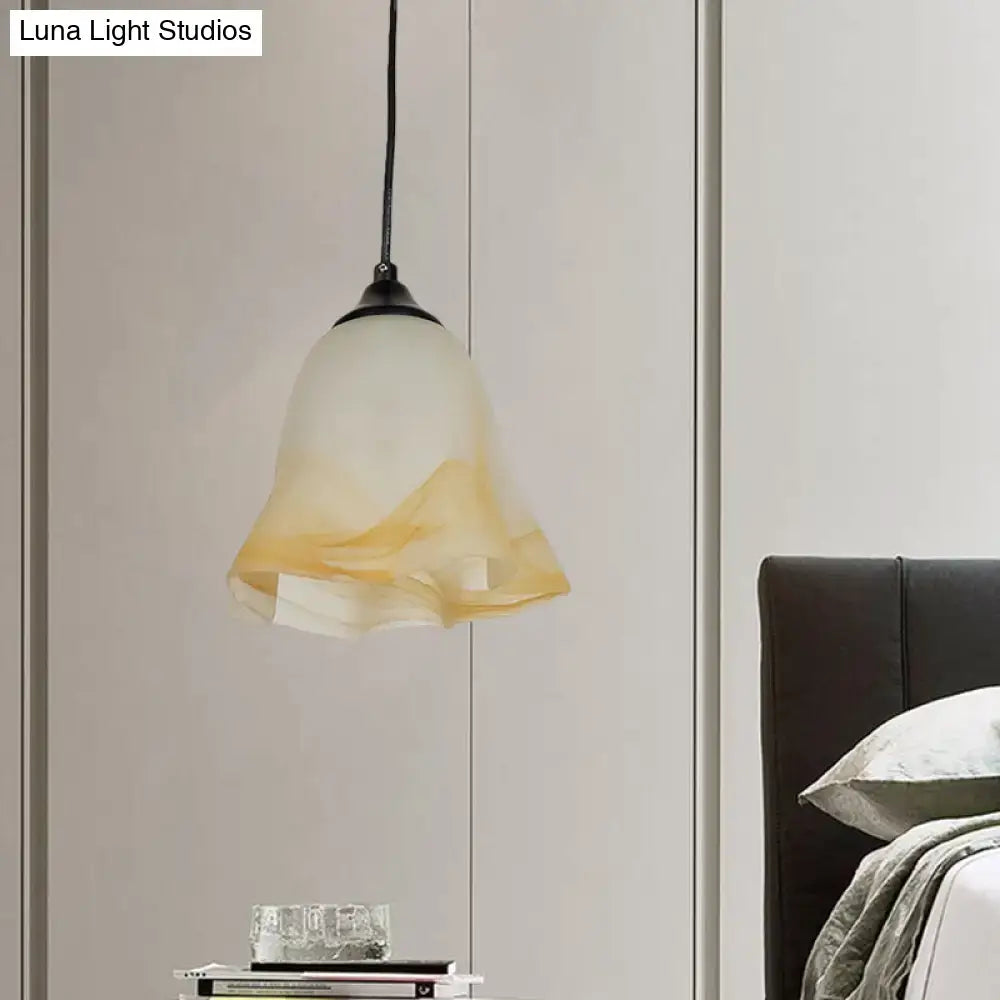 DecorBites traditional glass pendant light with flower cone shape and creamy white to soft yellow gradient shade for living room