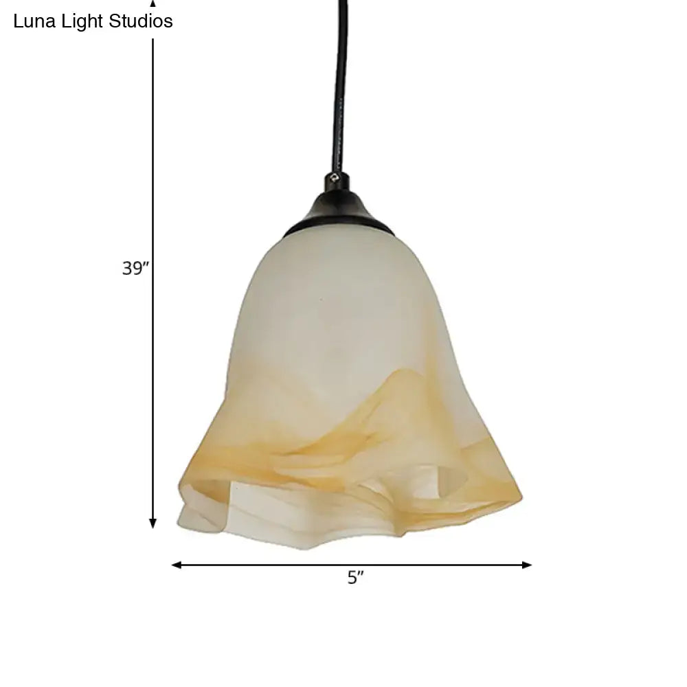 DecorBites traditional glass pendant light with flower cone shape and frosted amber cream shade for living room