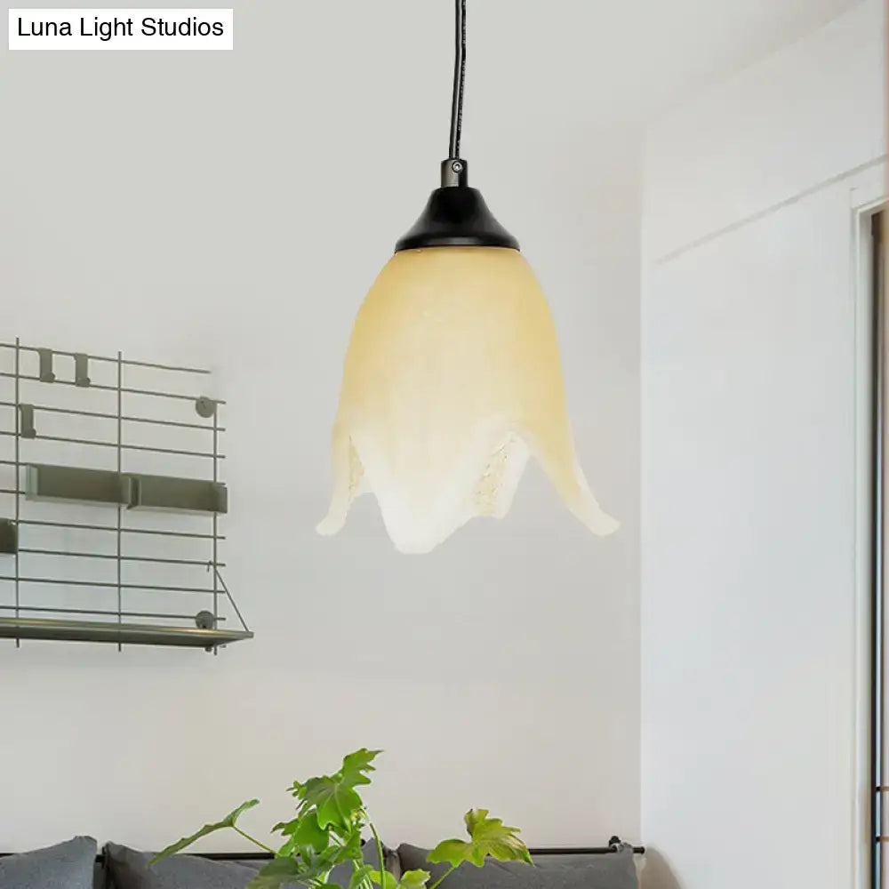 Decorbites traditional flower cone pendant light in warm frosted glass with black metal top for living room use