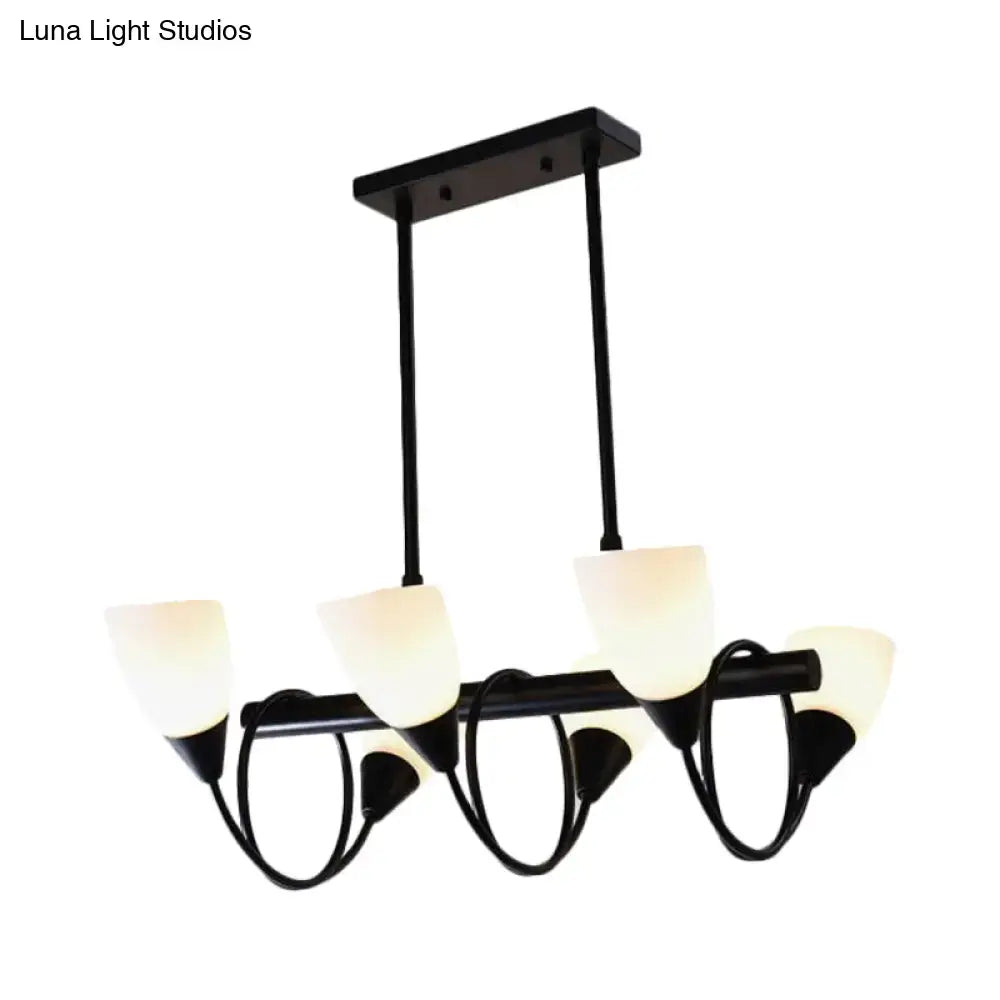 Black metal pendant light fixture with five frosted milky glass shades for traditional decor lighting
