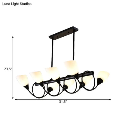 Black wrought iron decorbites™ pendant light fixture with six frosted milky glass shades in traditional design