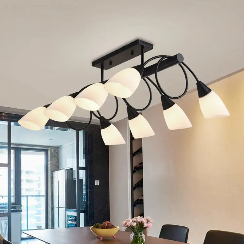 Black metal pendant light fixture with eight frosted milky glass shades from DecorBites traditional collection
