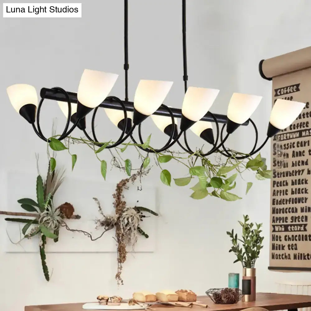 Black metal pendant light fixture with six frosted milky glass shades from DecorBites traditional collection