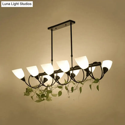 DecorBites traditional black metal pendant light fixture with six frosted glass shades and trailing green vines