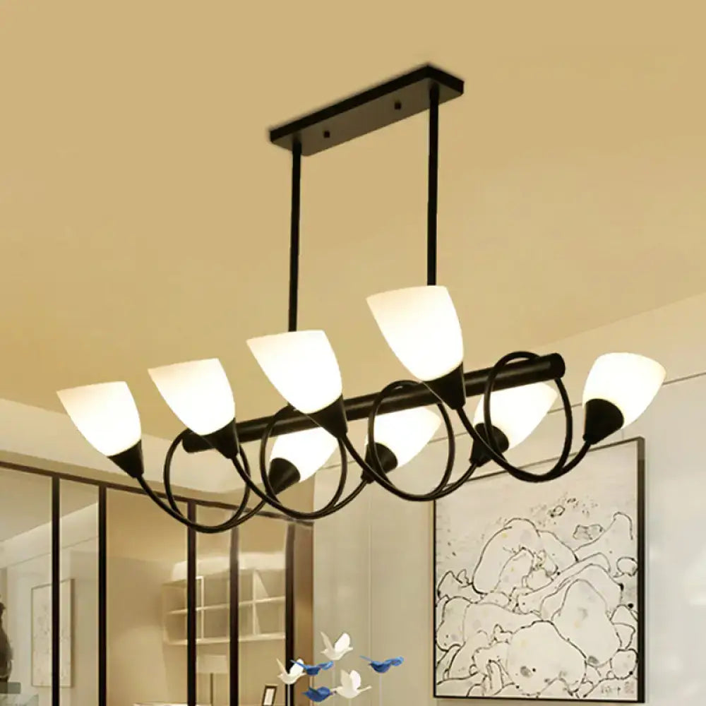 Black metal pendant light fixture with six frosted milky glass shades in a curved modern design by decorbites