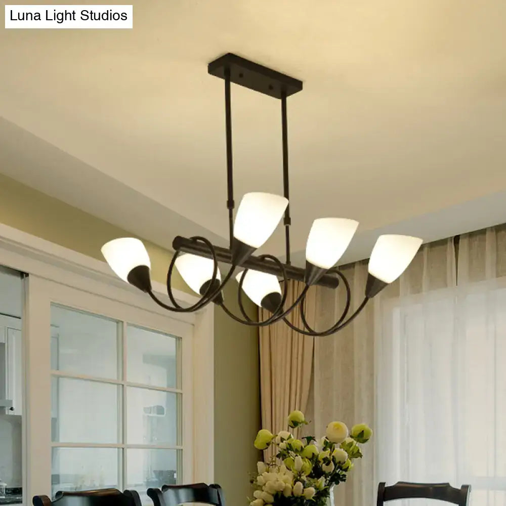Black wrought iron pendant light fixture with five frosted milky glass shades for elegant indoor lighting