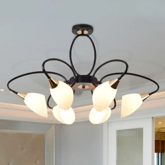 Black metal chandelier with five frosted oval white glass shades and gold-toned accents for traditional decor