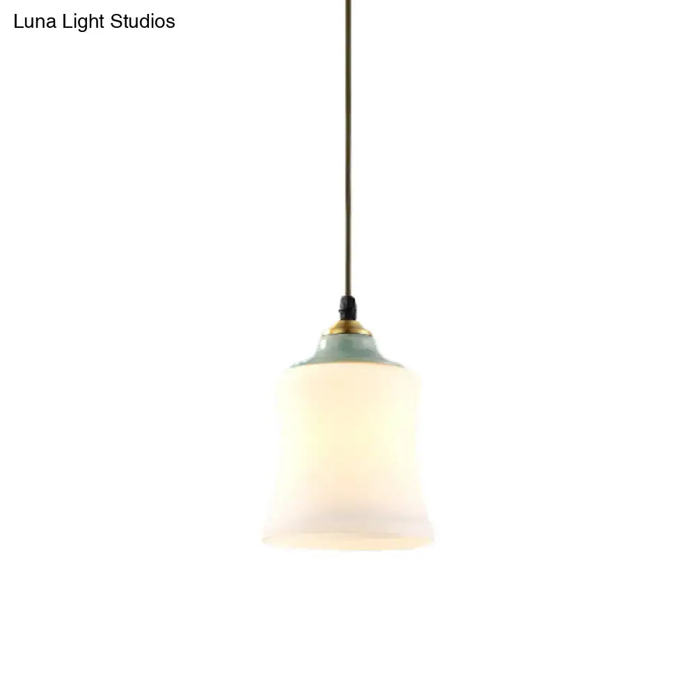 Decorbites™ traditional white glass pendant light with ceramic top featuring a frosted shade and mint green rim