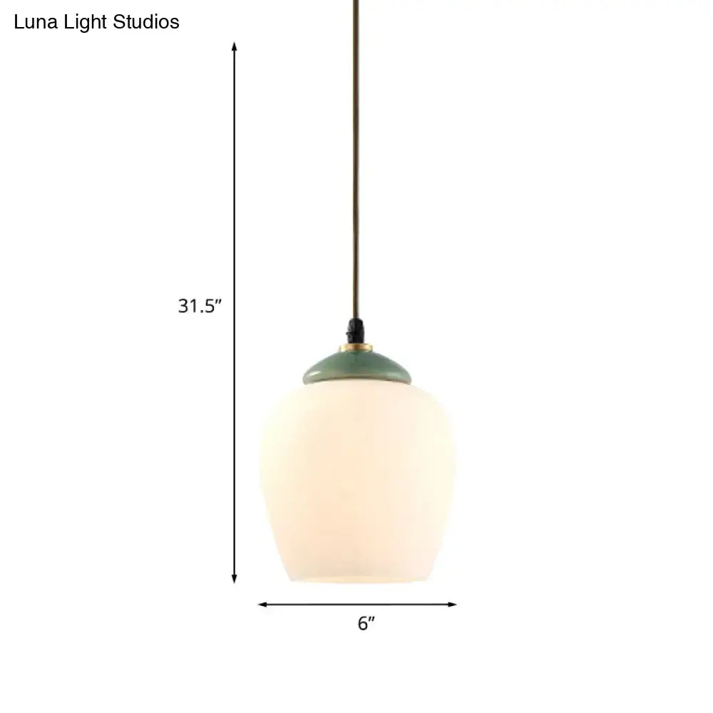 Decorbites traditional white glass pendant light with frosted glass, sage green ceramic top, and brass chain fixture