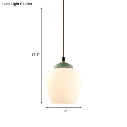 Decorbites traditional white glass pendant light with frosted glass, sage green ceramic top, and brass chain fixture