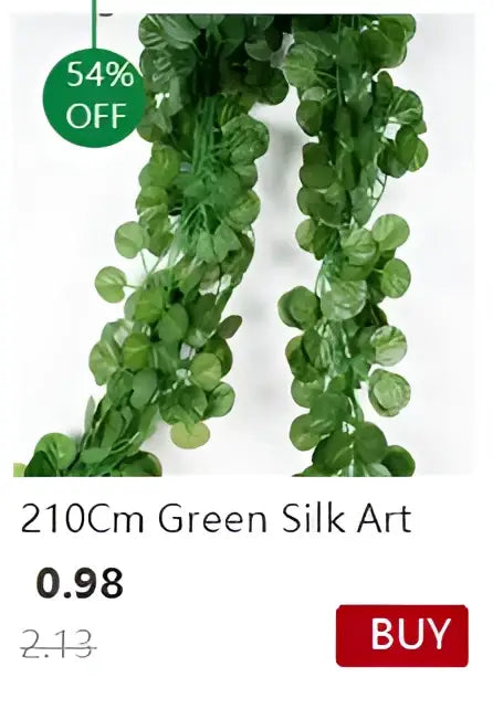 Green silk leaf garland displayed in a decorbites™ transparent nordic vase for plants and flowers