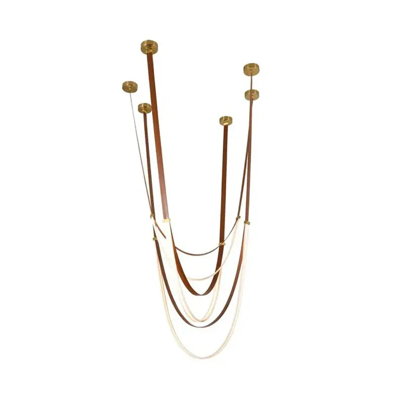 A modern DecorBites™ LED chandelier featuring tiers of brown and cream flexible leather belt straps with brass mounts