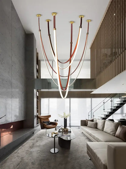 DecorBites leather belt led chandelier with curved light tubes and gold fixtures for trendy diy flexible living room lighting