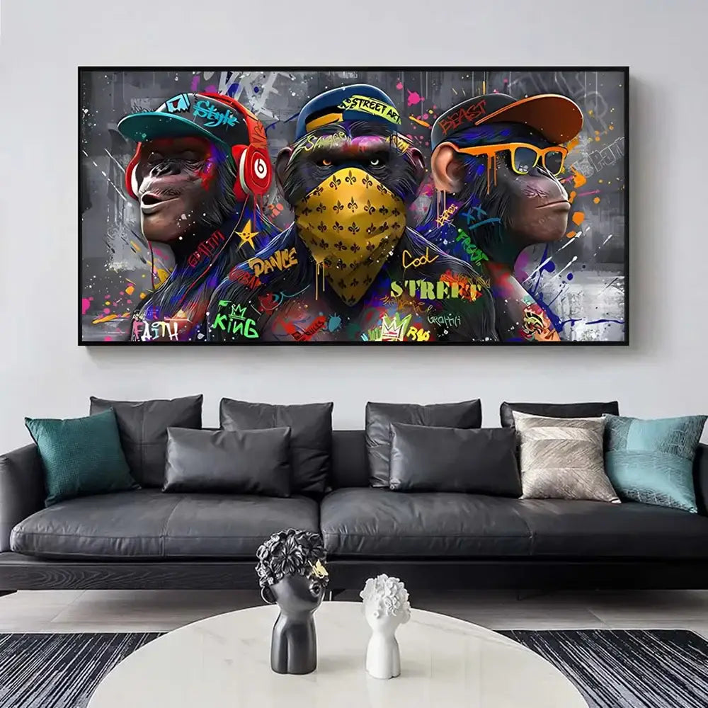 Vibrant graffiti-style wall art print of three trendy orangutans in colorful hats and streetwear by DecorBites™