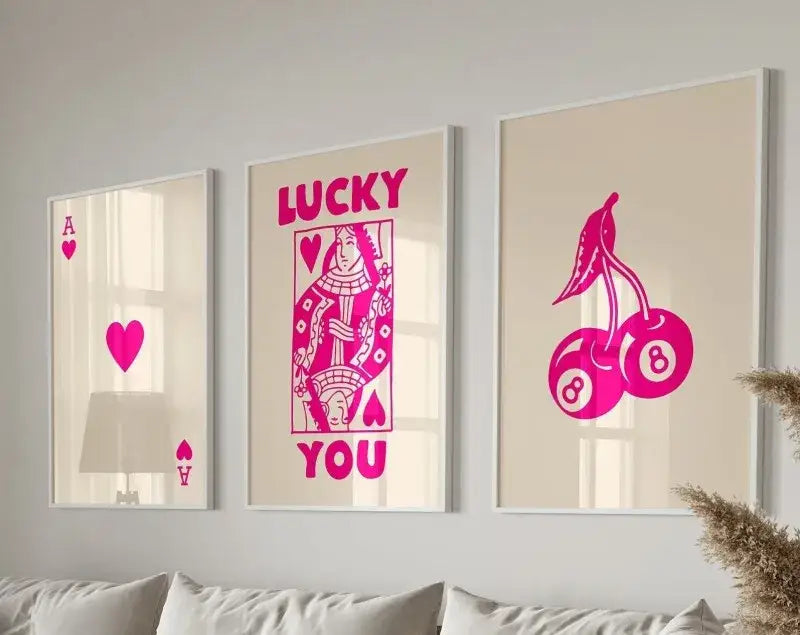 Three framed decorbites™ trendy retro wall art posters featuring vibrant pink retro wall art designs on cream background