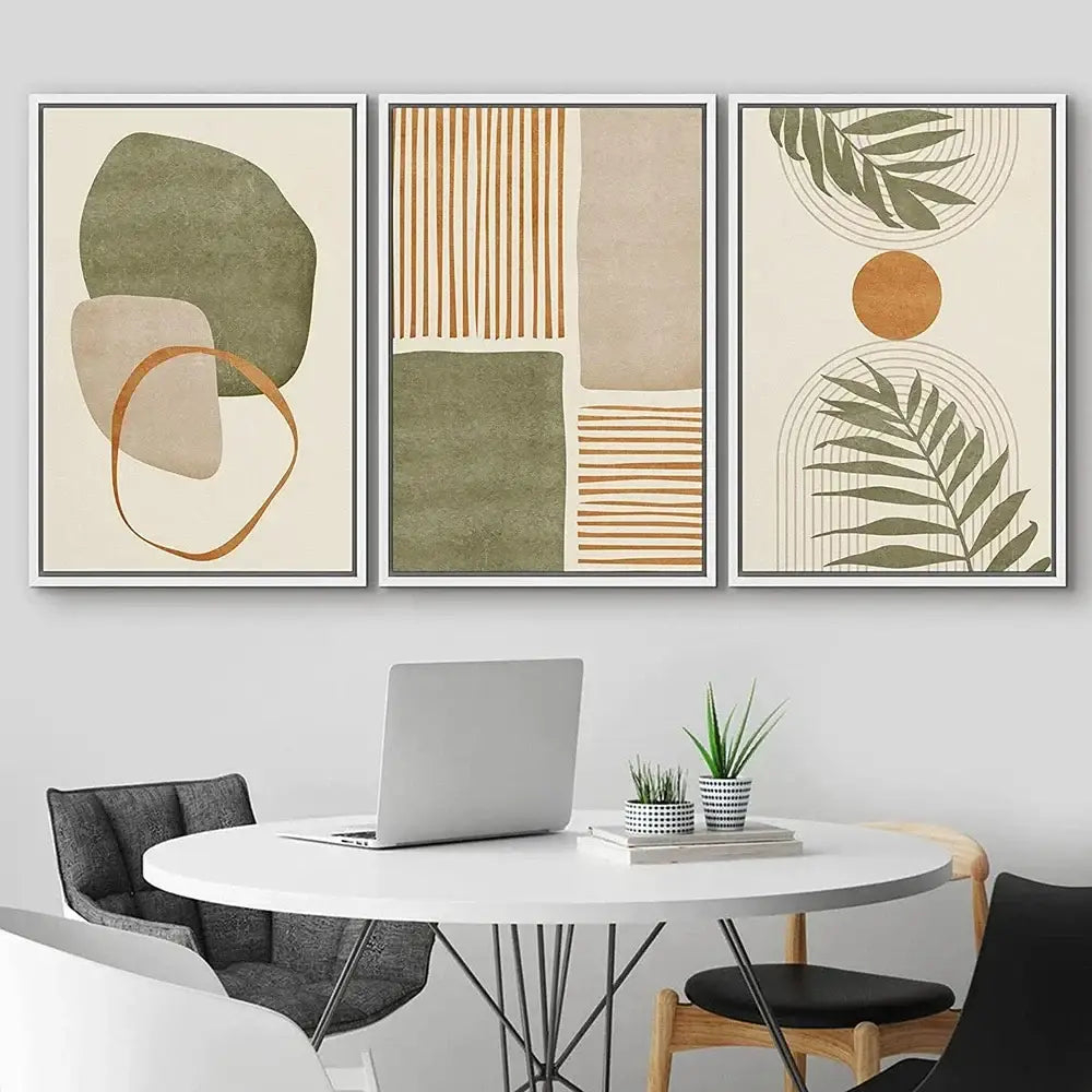 Set of three DecorBites tropical leaves canvas wall art featuring abstract shapes and earthy tones for modern decor