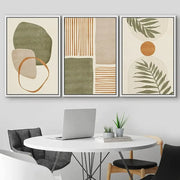 Set of three DecorBites tropical leaves canvas wall art featuring abstract shapes and earthy tones for modern decor