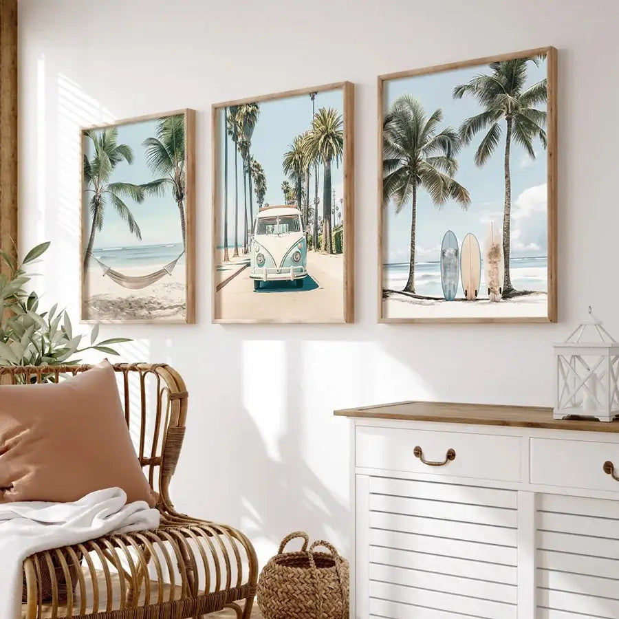 Three framed beach-themed prints with light wood frames featuring palm trees and a vintage van for tropical surfboard travel wall art