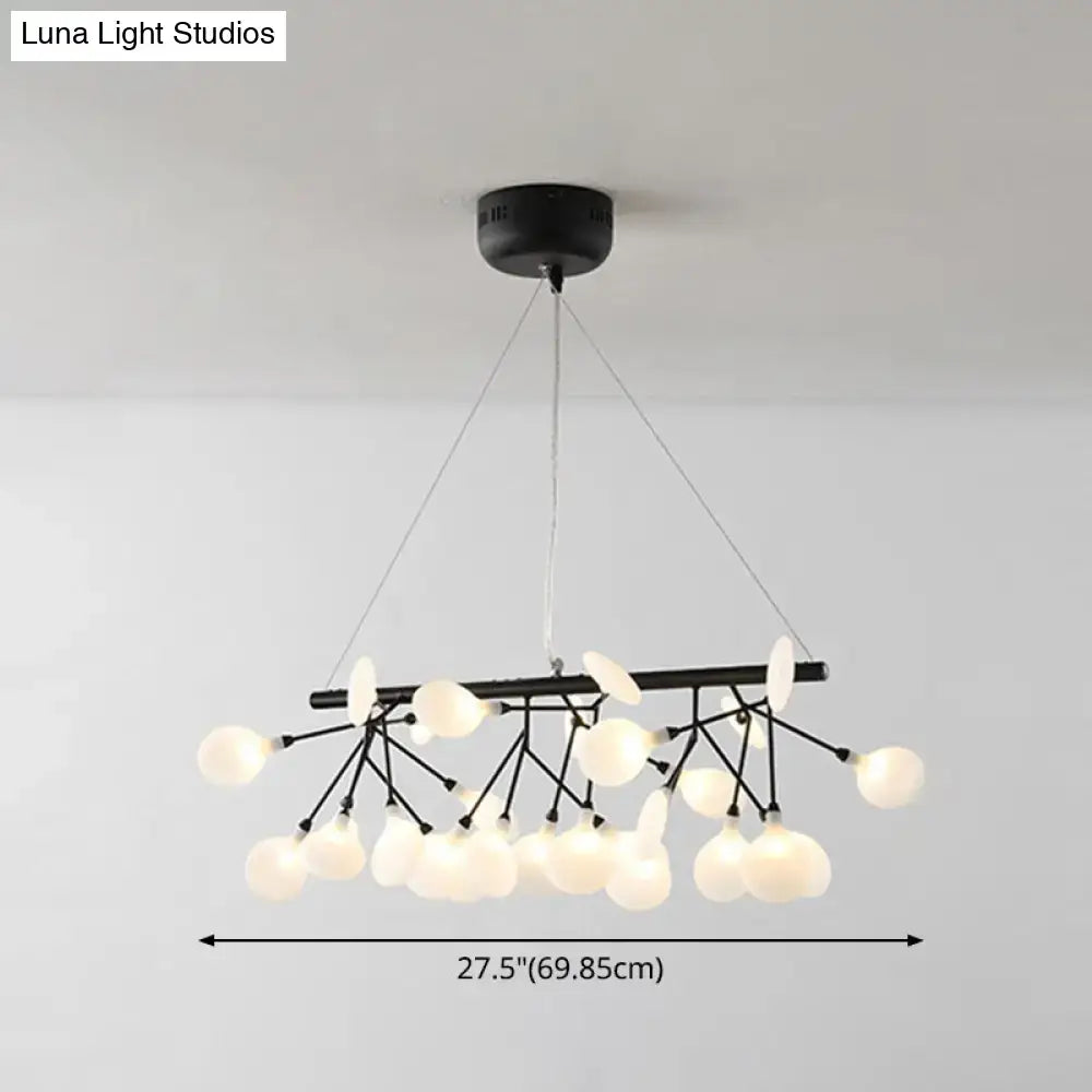 Black metal linear firefly pendant lighting with frosted glass globe ceiling light in a branching design for living room