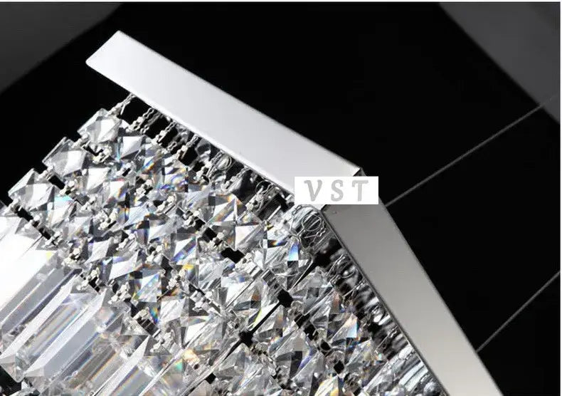 DecorBites upscale modern crystal chandelier with sleek chrome frame and clear crystals for dining room lighting