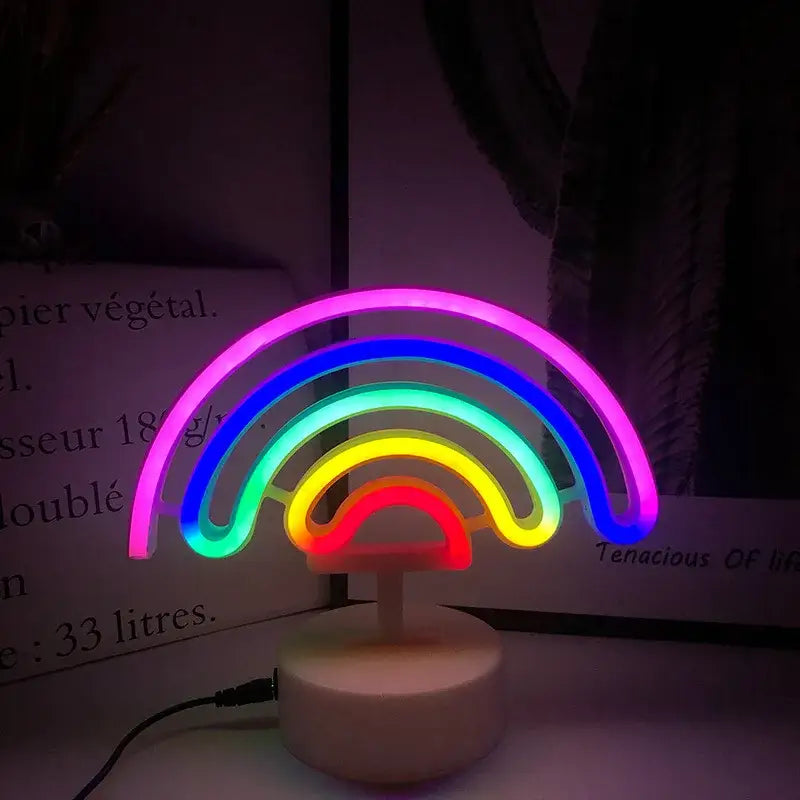 DecorBites™ led neon sign featuring a glowing rainbow design with vibrant arcs on a white circular base for home decor