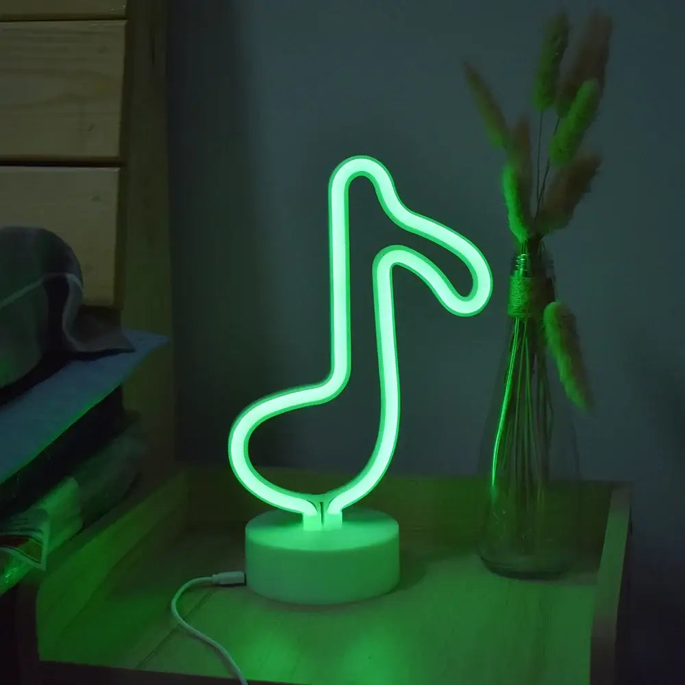 Decorbites usb led neon sign light in glowing green shaped like a musical note on white circular base for home decor