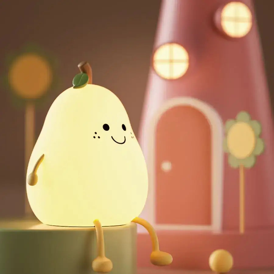 A soft yellow silicone pear-shaped rechargeable night light with smiling face green stem and tiny legs for kids bedroom
